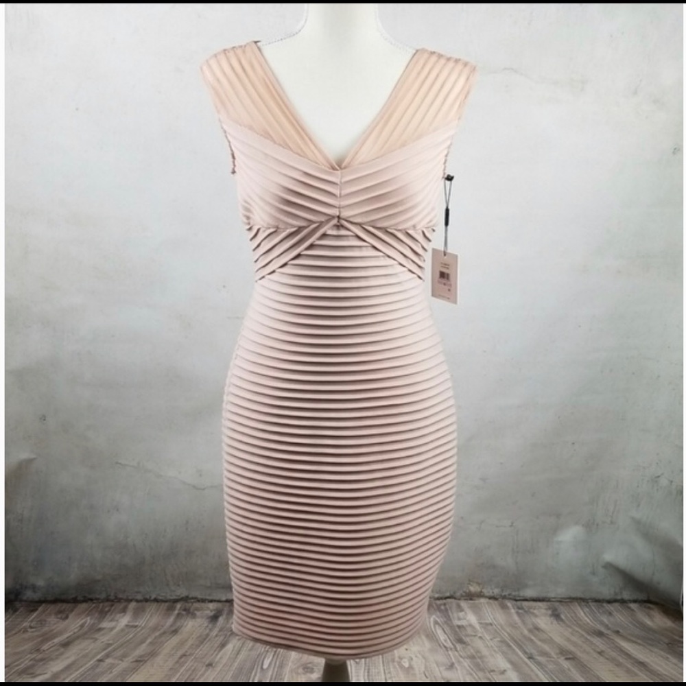 Blush colored Calvin Klein body con dress